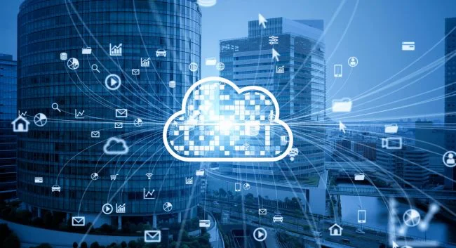 Office buildings overlayed with cloud computing icons and light rays flowing from the center